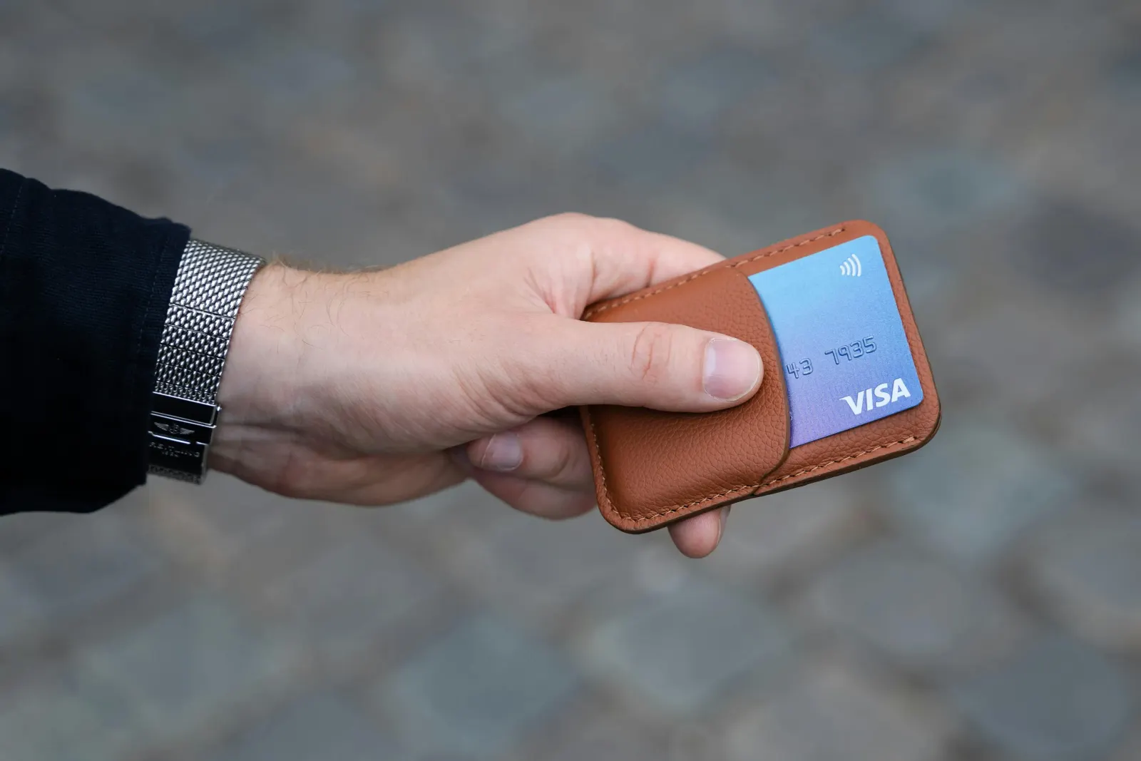 Traditional debit card inside a wallet