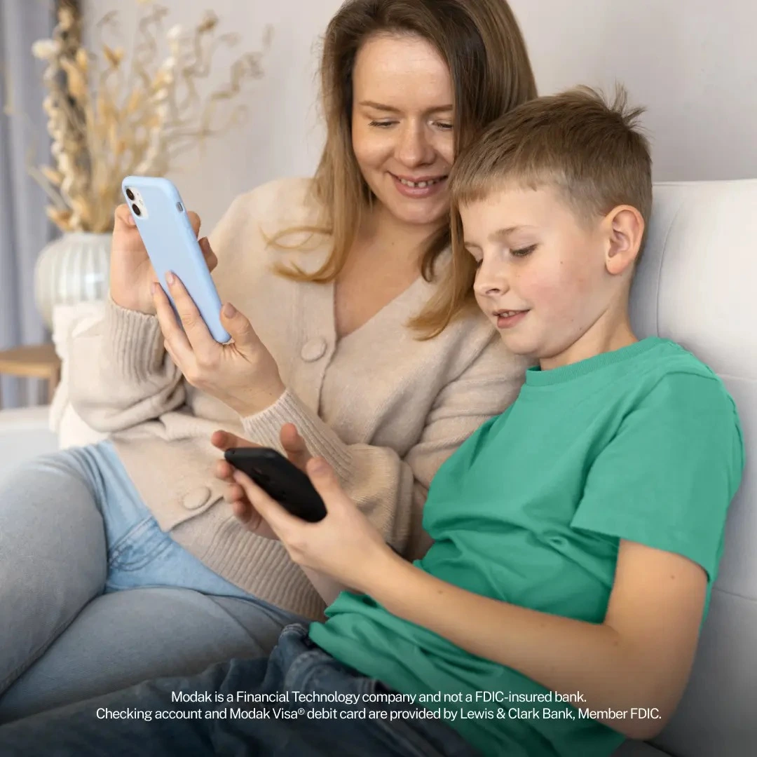 Mom and teen boy using their phones together